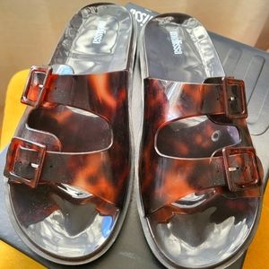 Never worn Melissa slide in tortoise shell. Size 8